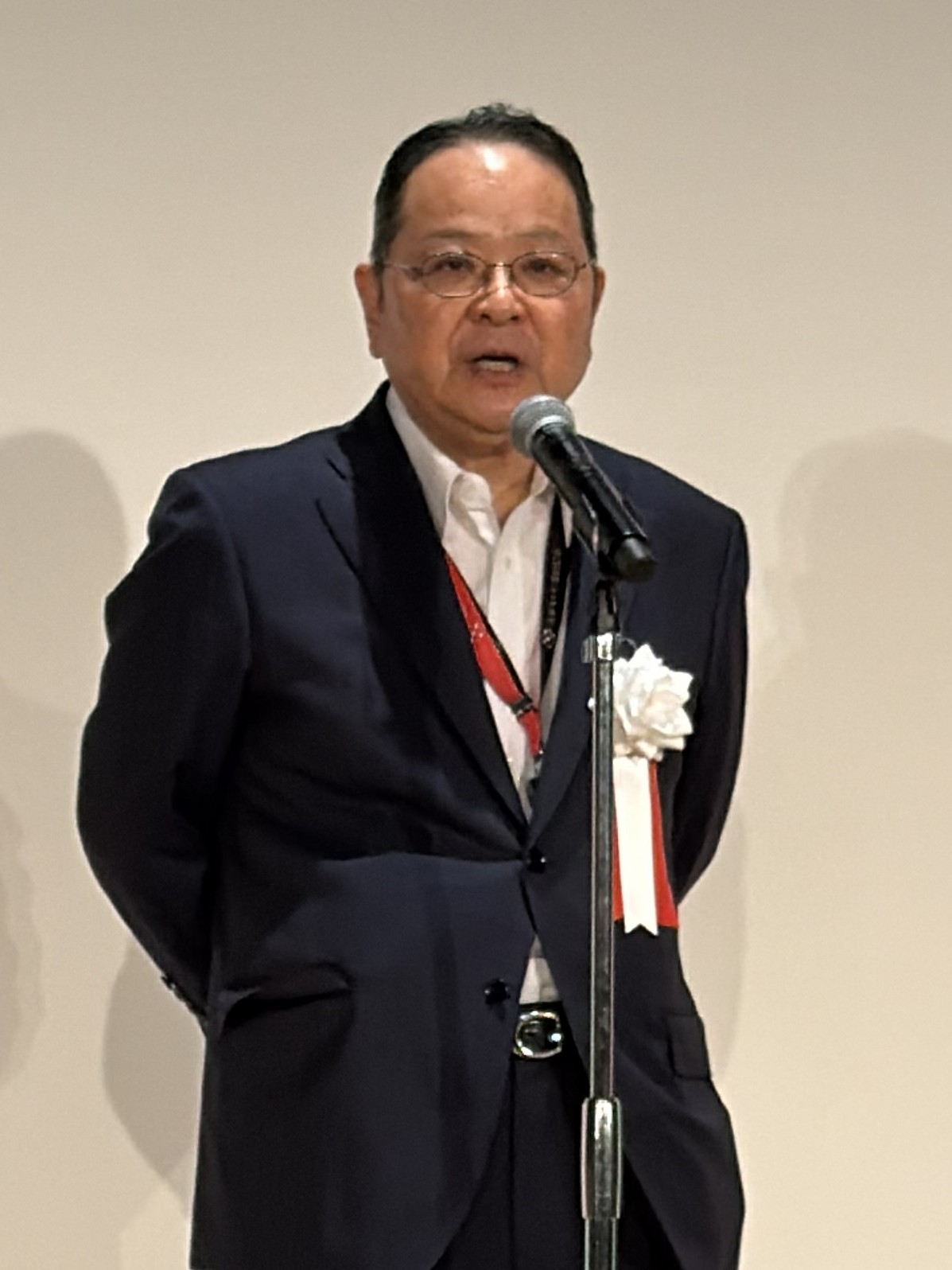 登壇した荒井寿一会長