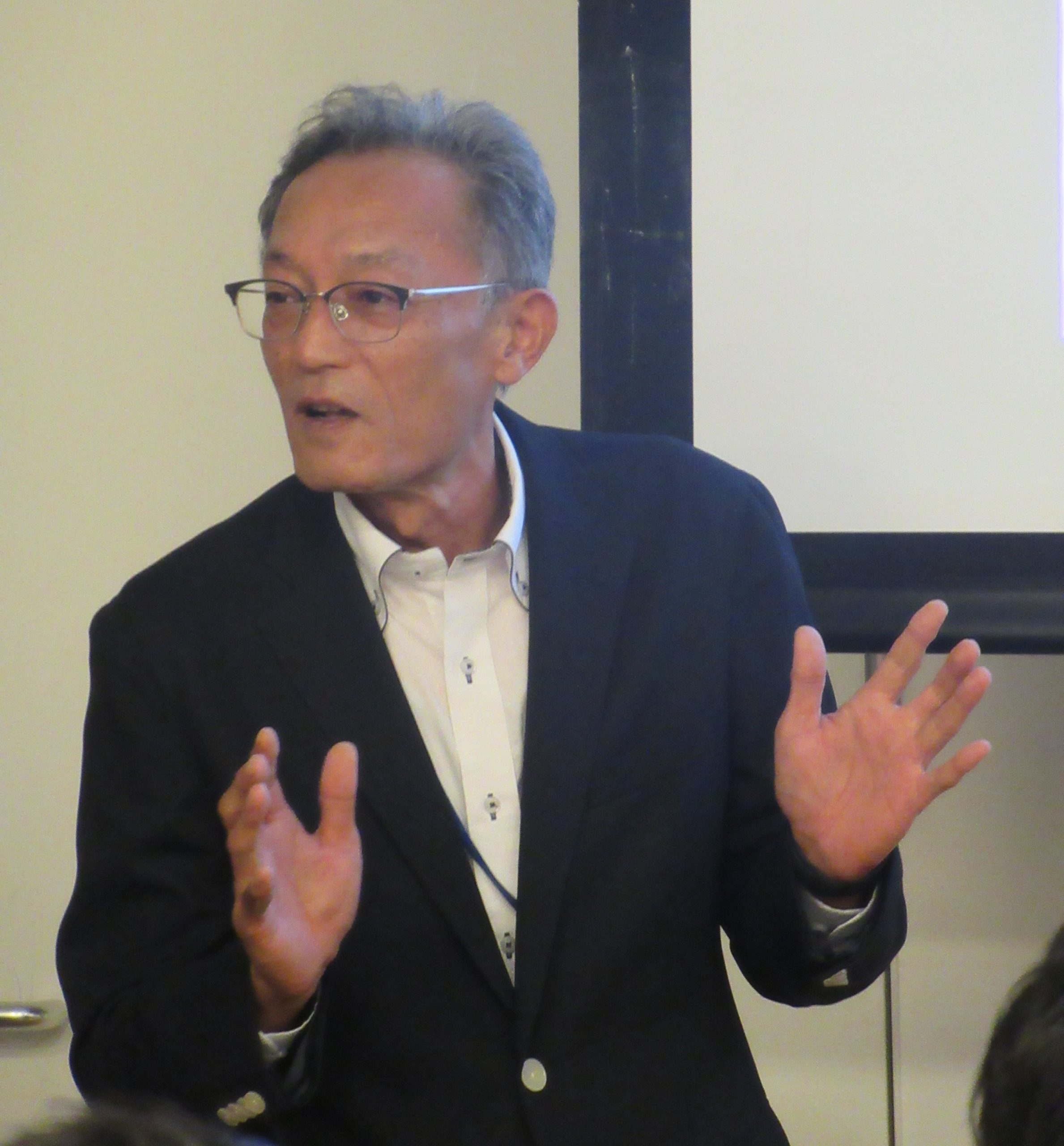 交流会の冒頭であいさつする拡販流通委員会の遠藤潔委員長(ホンダ販売ムサシノ代表取締役)